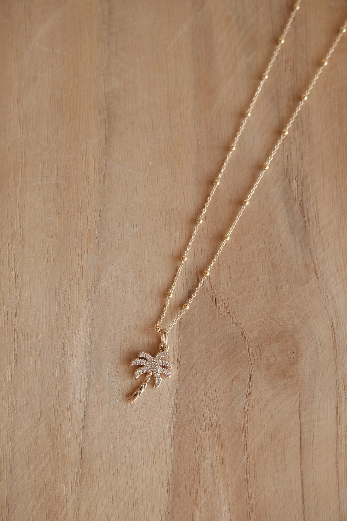 Collier chaîne palmier strass