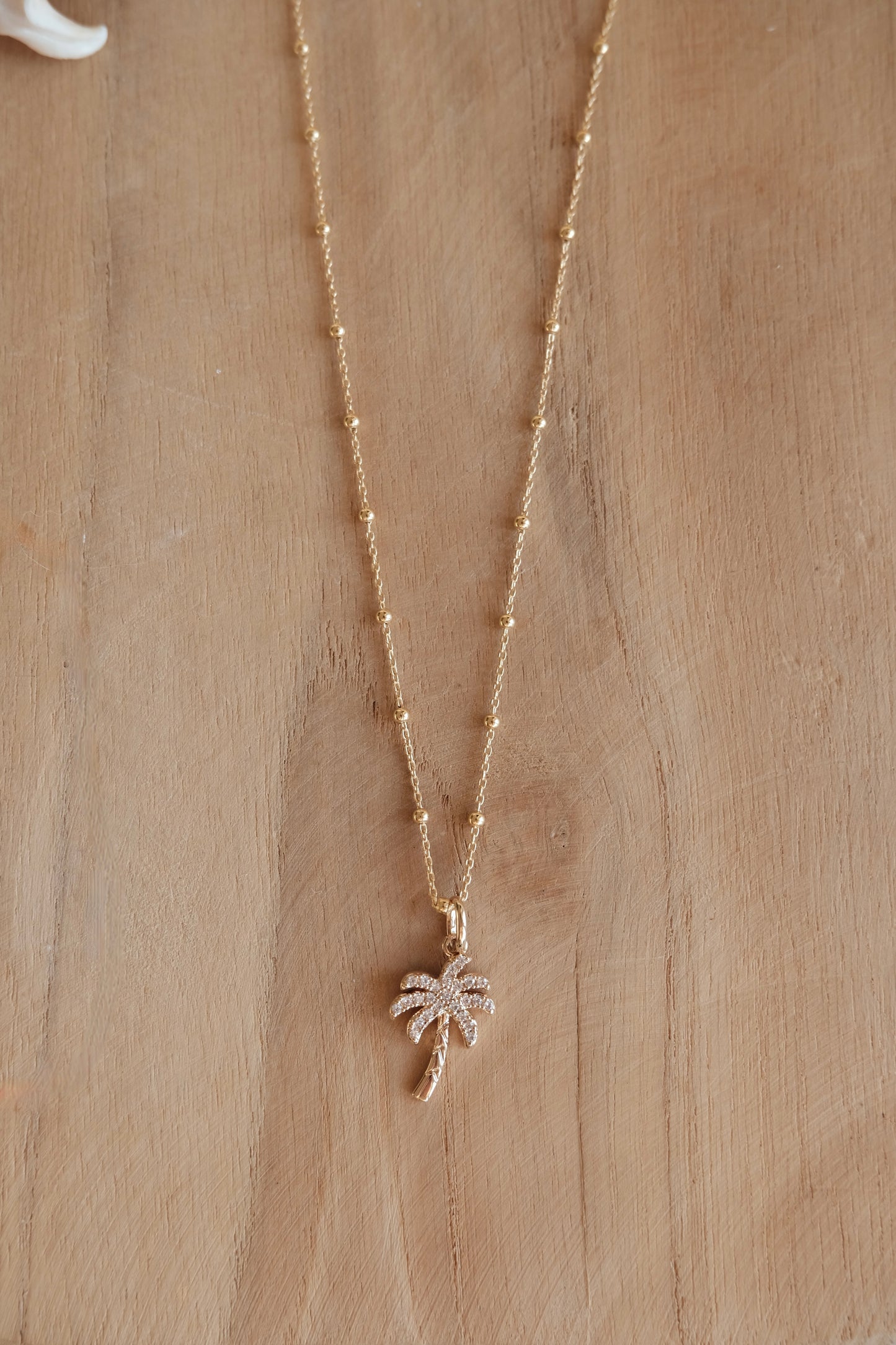 Collier chaîne palmier strass