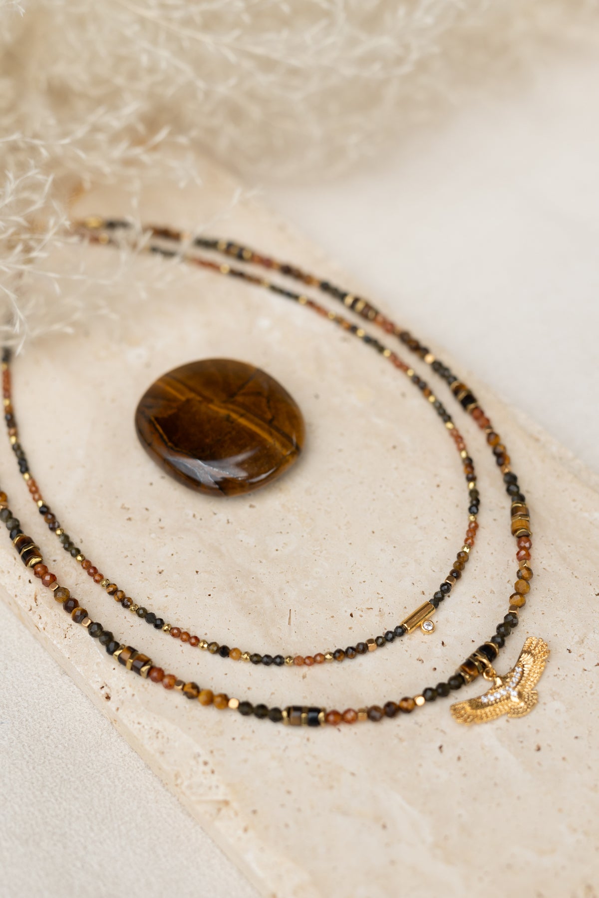 Colliers tiago et Aguila en pierres naturelles oeil du tigre obsidienne cornaline