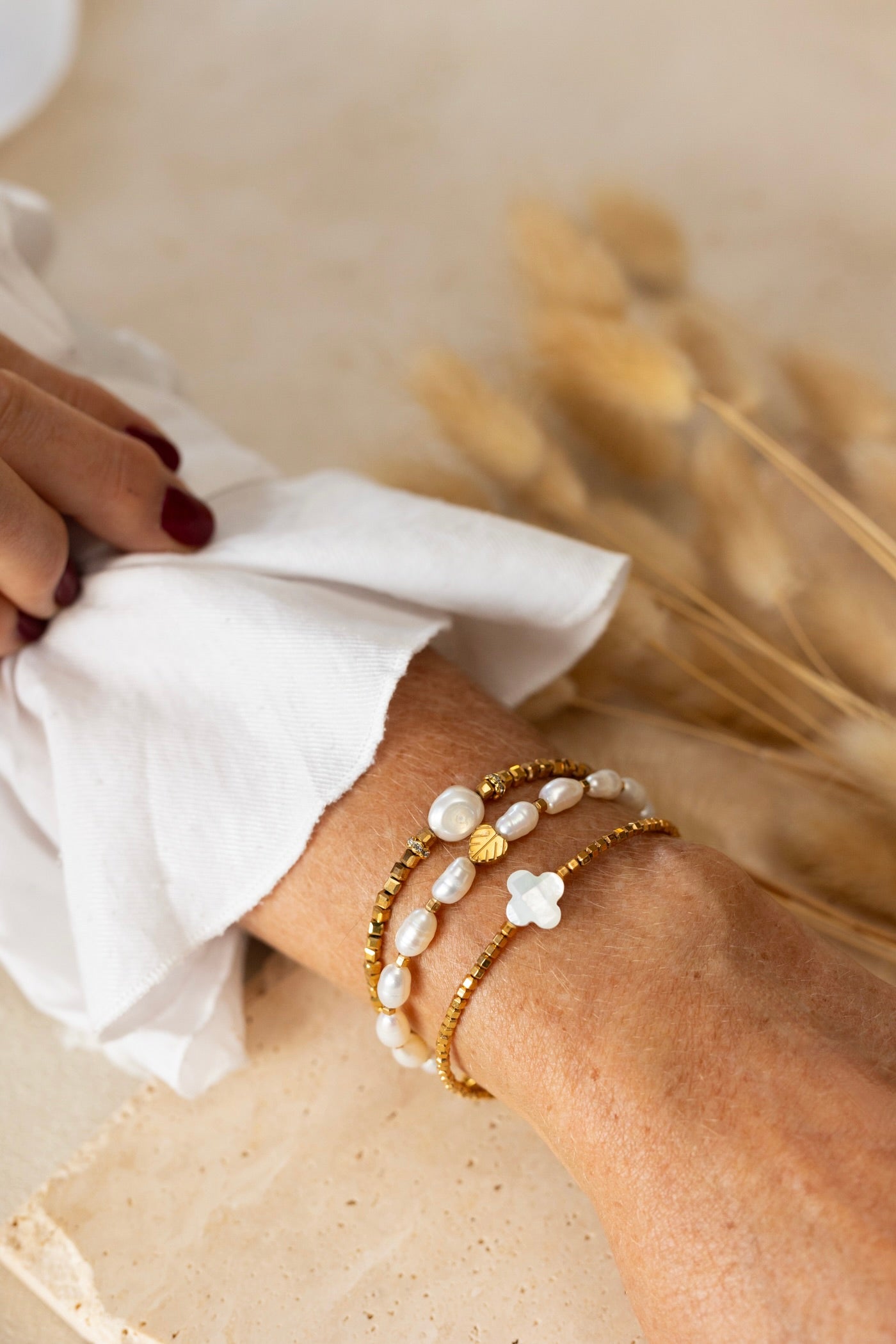 Bracelet Chance hématite dorée et trèfle nacre